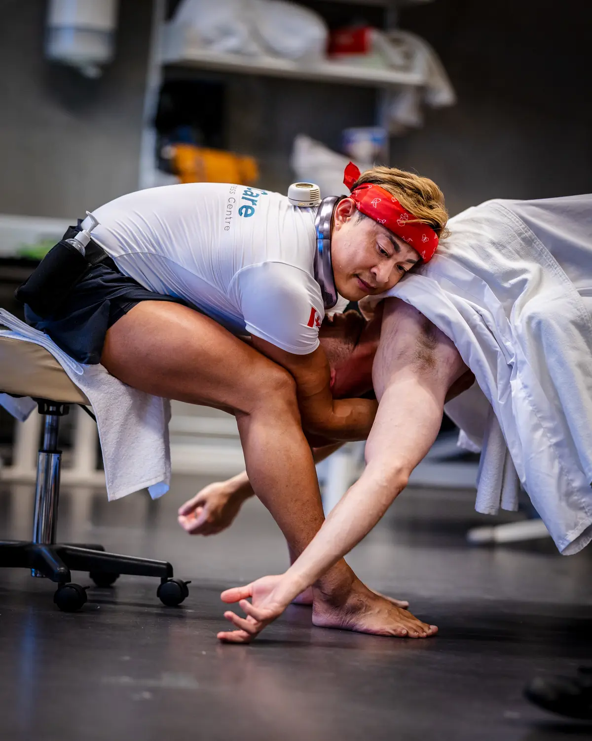 Hubert Mak using a deep lunge during treatment